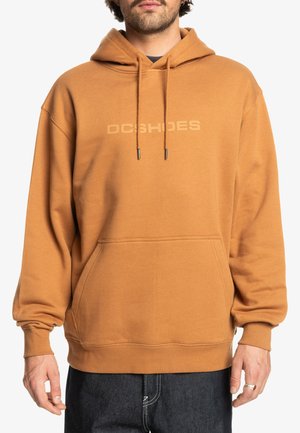 Brown hooded sweatshirt with a kangaroo pocket, drawstrings, and a subtle logo on the chest. Soft fabric with ribbed cuffs and hem.