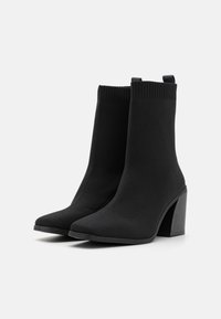 Marks & Spencer Botki