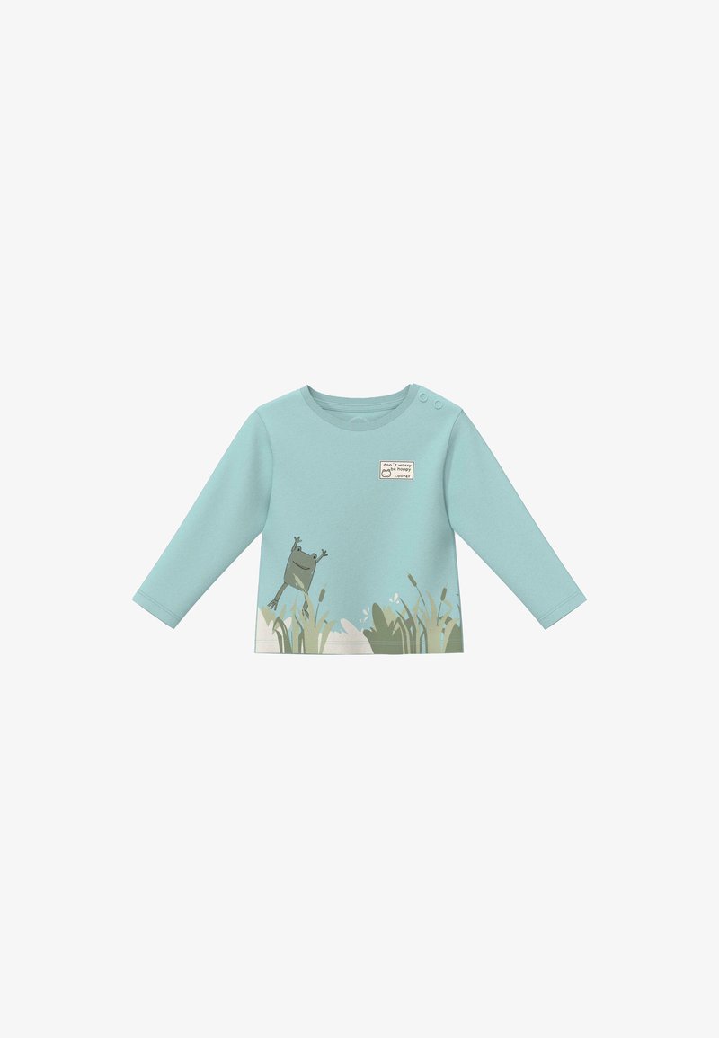 Chemise bleu clair à manches longues pour tout-petit, avec imprimé d'herbe et de grenouille sur l'ourlet et un écusson indiquant « ne t'inquiète pas, sois heureux » sur la poitrine.