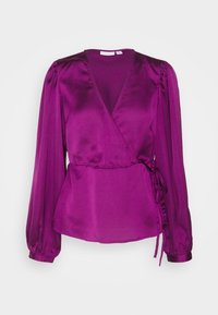 Blusa avvolgente in satin viola con maniche lunghe a sbuffo, scollatura a V e laccetti laterali. Tessuto morbido con una finitura liscia.
