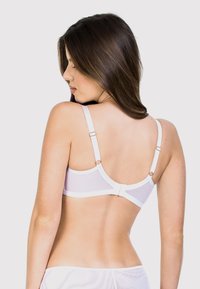 Biały stanik z regulowanymi ramiączkami, przezroczystym materiałem i zapięciem na hak i oczko. Posiada gładkie wykończenie i minimalistyczny design.