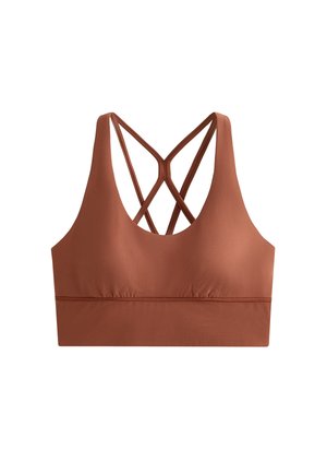 Bronz színű sportmelltartó rugalmas anyagból, klasszikus kerek nyakkivágással, széles pánttal, és keresztbe nyúló hátkiképzéssel, amely fokozza a támogatást és a kényelmet.