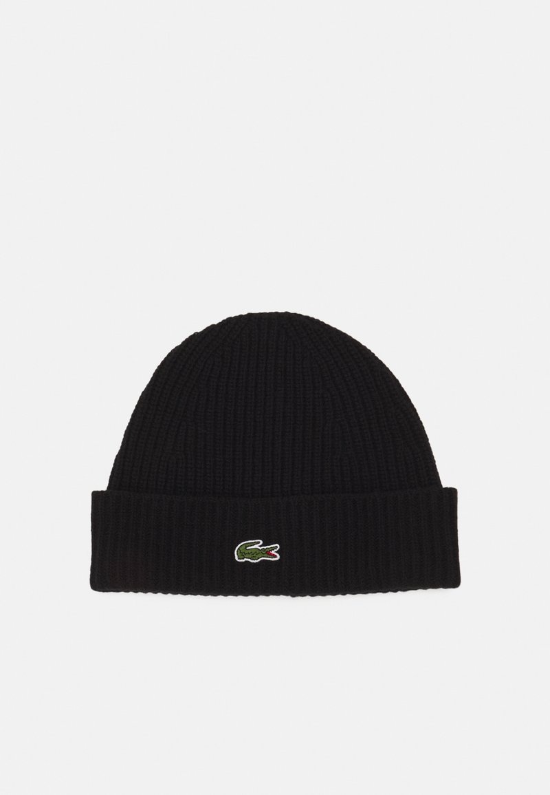 Bonnet noir en tricot côtelé avec revers, présentant un petit logo crocodile vert et rouge au centre devant.