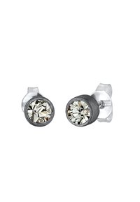 Stud auskarai su apvaliais, skaidriais kristalais, įstatytais į metalinį pilką tekstūrinį pagrindą su skaidriais užpakaliais. Elegantiškas ir minimalistinis dizainas.