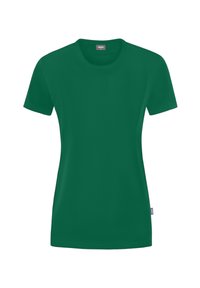 Maglietta verde a maniche corte realizzata in tessuto morbido, con scollatura tonda e una piccola etichetta con logo sul lato. Design e vestibilità semplici.