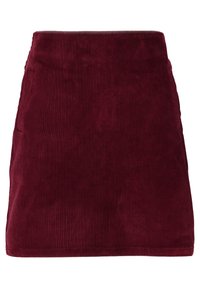 Gonna mini in corduroy bordeaux con superficie testurizzata, dotata di vita aderente e sottili tasche laterali.