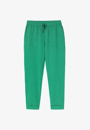 Zelene jogger hlače z elastiko v pasu in nastavljivo vrvico. Imajo dve stranski žep in ožji zaključek na gležnjih. Gladka tekstura.
