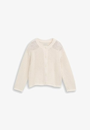 Cardigan en maille à manches longues couleur crème avec fermeture bouton et motif ajouré, posé à plat sur un fond blanc.