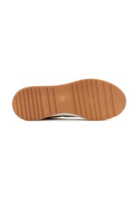 Rubber sneaker sole featuring a textured, ridged pattern in beige and brown tones. Smooth upper with subtle color contrast accents.
