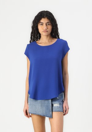T-shirt blu royal a maniche corte con una vestibilità rilassata e scollo rotondo. Realizzato in tessuto morbido, presenta un orlo leggermente curvo.