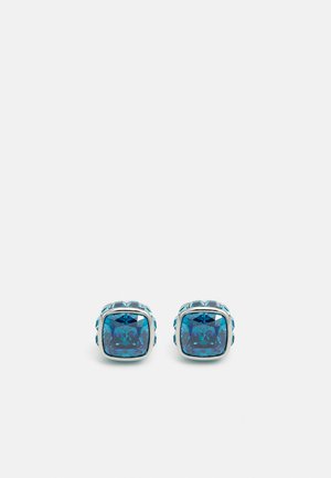 Rectangular earrings featuring a large, blue faceted stone set in a silver-tone metal frame with textured accents.