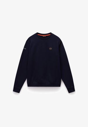 Marineblå sweatshirt lavet af blødt stof, med rund halsudskæring, ribbede manchetter og et lille mærke-logo på brystet.