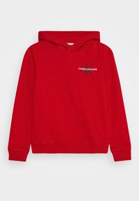 Felpa rossa in cotone con tasca a marsupio, polsini e orlo a coste, con un logo bianco e nero sul lato sinistro del petto.