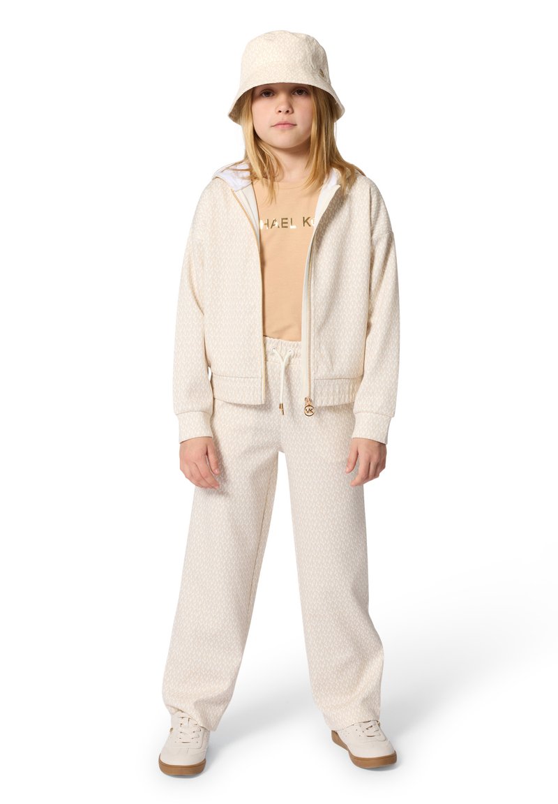 Ανοιχτόχρωμο, μοτίβο φόρμας με ζακέτα με φερμουάρ, παντελόνι με κορδόνι και καπέλο τύπου bucket που ταιριάζει. Κατασκευασμένο από απαλό, υφασμάτινο ύφασμα με υφή.