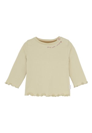 Beige Baby Langarmshirt mit Rüschensaum, einem Knopf an der Schulter und dem Text "du bist süß, ich liebe dich" mit einem Herz.