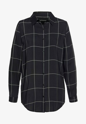 Black long-sleeve shirt made of smooth fabric, featuring white grid pattern, front button closure, and pointed collar.
