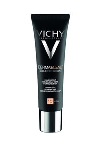 Black tube of Vichy Dermablend foundation, featuring a silver cap, white logos, and a peach label indicating shade 15 Opal, with textured finish.