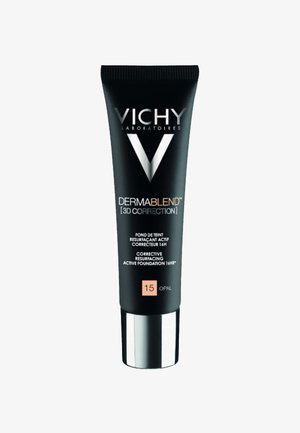 Schwarze Tube von Vichy Dermablend Foundation, mit silberner Kappe, weißen Logos und einem pfirsichfarbenen Etikett, das den Farbton 15 Opal angibt, mit strukturierter Oberfläche.