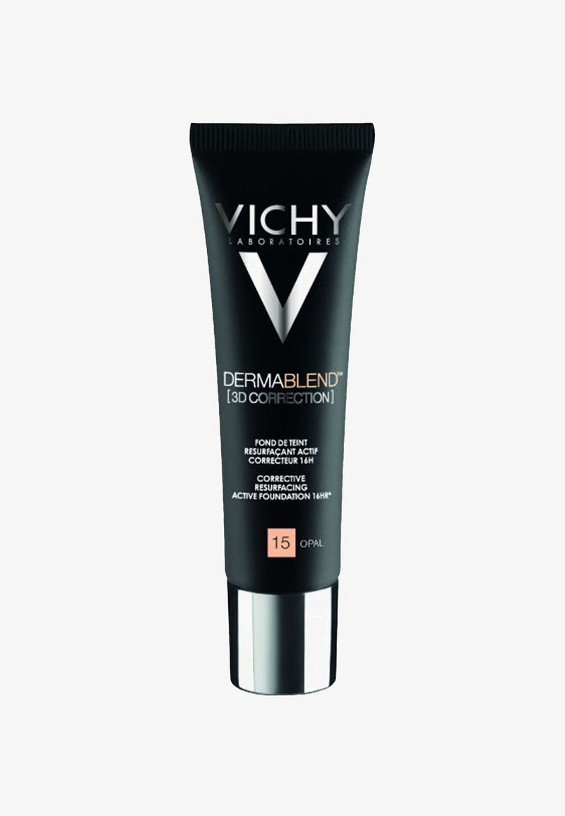 Black tube of Vichy Dermablend foundation, featuring a silver cap, white logos, and a peach label indicating shade 15 Opal, with textured finish.