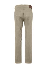 Beige cotton trousers with straight legs, two back pockets, and subtle stitching detail. Features a brown leather brand patch at the waist.