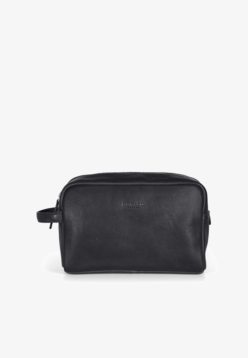 Svart läder toalettväska med slät textur och rektangulär form. Har en dragkedjestängning och ett sidhandtag för enkel transport.
