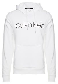 Sudadera blanca de tela suave con un gran logo negro de "Calvin Klein", cordones, un bolsillo frontal y puños y dobladillo acanalados.