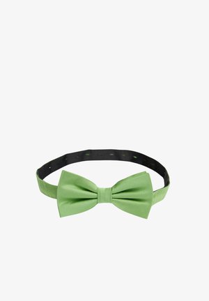 Vihreä satiininauha, jossa on teksturoitu pinta, ja musta säätökaulus, jossa on pyöreitä leikkuureikiä.