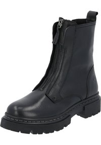 Botín negro de cuero hasta el tobillo con cremallera lateral, suela de goma gruesa y detalles en costura blanca. Textura suave y diseño aerodinámico.