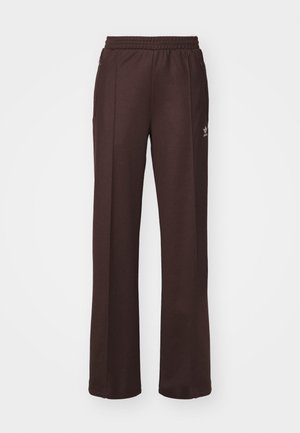 Pantaloni sportivi marroni con elastico in vita, due tasche laterali e un piccolo logo sul lato sinistro, realizzati in un tessuto morbido.