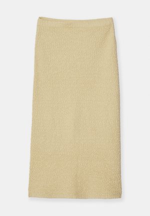 Φούστα μήκους γόνατος από ανοιχτό μπεζ υφασμάτινο υλικό με απαλή υφή, που διαθέτει διακριτικό σχέδιο και ελαστική ζώνη για άνετη εφαρμογή.