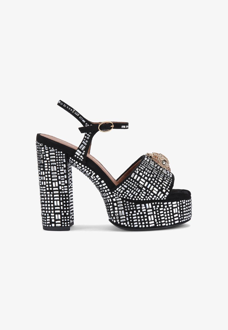 Black platform sandals with block heels, featuring a textured black and silver geometric pattern, adjustable strap, and decorative embellishments.