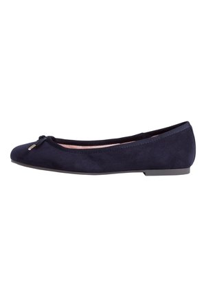 Navy suede ballet flat with a rounded toe, bow accent on the front, and a flexible rubber sole. Minimalist design with a smooth texture.