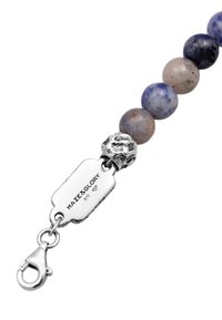 Beaded bracelet featuring polished purple and gray stones, with a silver clasp and tag inscribed "HAZE&GLORY 925."