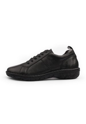Black leather sneaker with a smooth finish, rounded toe, lace-up design, and rubber sole featuring textured detailing.