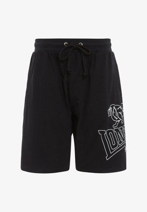 Mustat puuvillashortsit, joissa on joustava vyötärö, säädettävä nyöri ja valkoiset painetut grafiikat, joissa on leijona ja teksti sivussa.