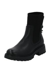Botín negro que presenta un exterior de cuero suave con un upper de punto acanalado. Suela gruesa con un patrón de relieve y detalle de botón lateral.