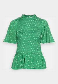 Top verde de mangas curtas com textura franzida, gola ruflada e mangas com efeito de flare. Apresenta padrões florais brancos e uma bainha peplum.