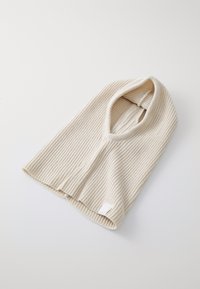 Ribbed cream-colored knit neck warmer with a rounded collar and a small logo tag at the base, laid flat on a light background.