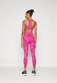 Puma TRAIN 7/8 - Leggings - magenta gleam