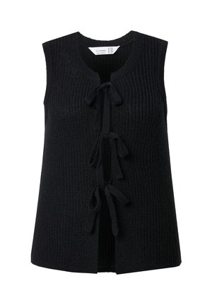 Black knitted vest featuring a ribbed texture, open front, and tie closure. No sleeves, with a straight cut and relaxed fit.