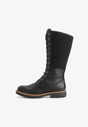 Tall black leather boot with fleece upper part, lace-up front, and rugged sole, shown from side on white background.