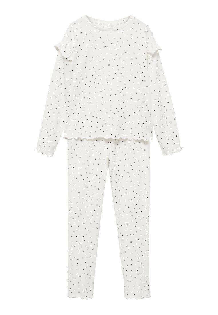 Valkoinen pyjama-asusetti mustalla tähtikuviolla. Pitkähihainen toppi, jossa on röyhelöhihat ja aaltoilevat reunat; yhteensopivat istuvat housut samankaltaisilla yksityiskohdilla.