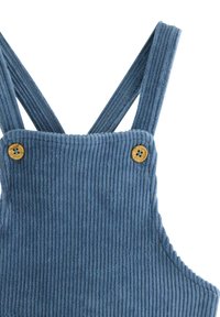 Blå kordfløjl baby overalls med brede stropper og to træknapper på forsiden.