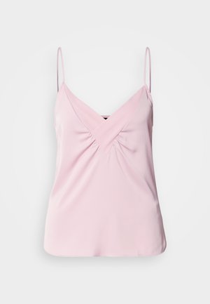 Lys pink ærmeløs top med V-hals og samlet detalje foran. Lavet af glat stof med tynde skulderstropper og en rund kant.