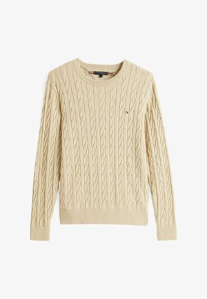 Beige kabelstrikket genser med rund hals, lange ermer og liten Tommy Hilfiger-logo på venstre bryst.