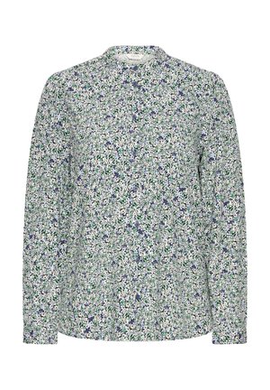 Blouse à manches longues avec col haut, présentant un motif floral dense dans des couleurs blanche, bleue, verte et noire.