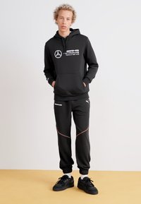 Puma Teplákové kalhoty - puma black