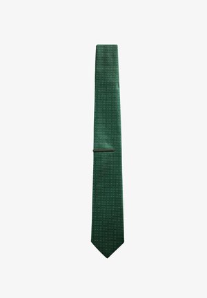 Dark green textured necktie with a small repeating diagonal pattern and a dark tie bar near the middle.