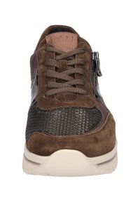 Brown suede and mesh sneaker with a textured upper, lace closure, side zipper detail, and a white rubber sole. Flat laces and logo patch present.
