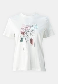 White cotton t-shirt featuring a line drawing of a woman’s face surrounded by floral and butterfly illustrations in soft colors.